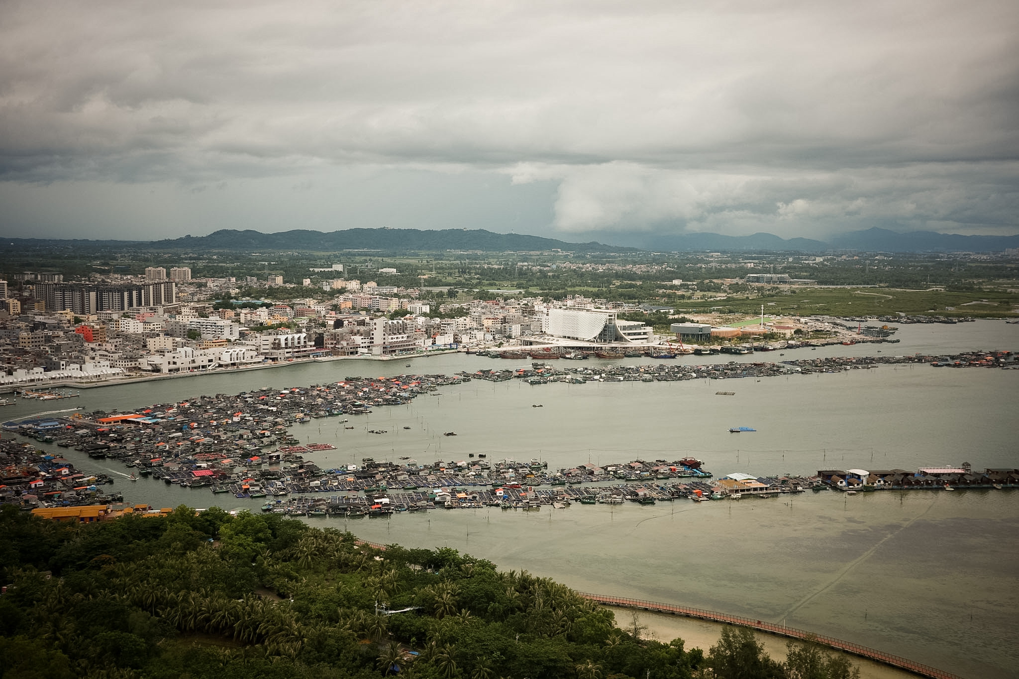 The Danjia fishing rafts seen from above, floating on the water off Lingshui.